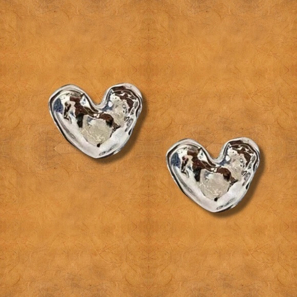 Heart shaped silver tone earrings